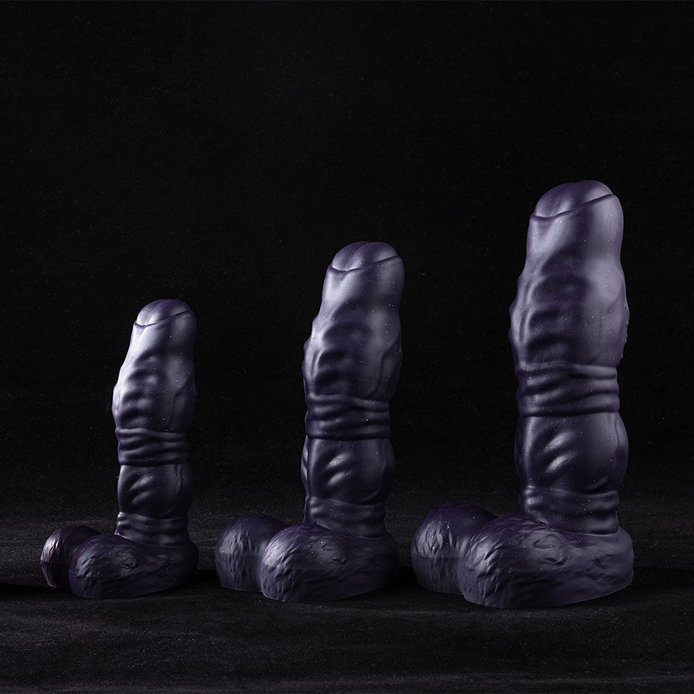 Galactic Twilight fantasy dildo displayed diagonally, showcasing dual knots and nubbed spine against black background.