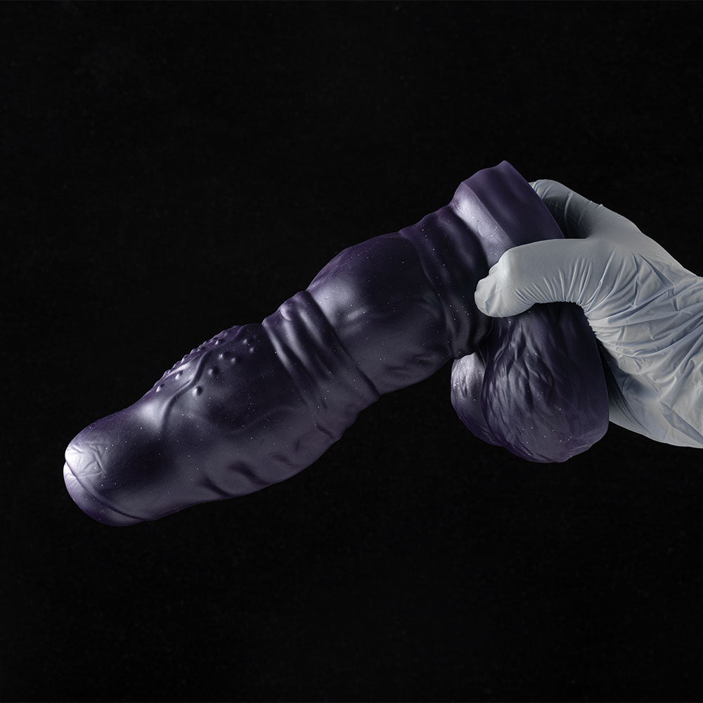Galactic Twilight fantasy dildo displayed diagonally, showcasing dual knots and nubbed spine against black background.