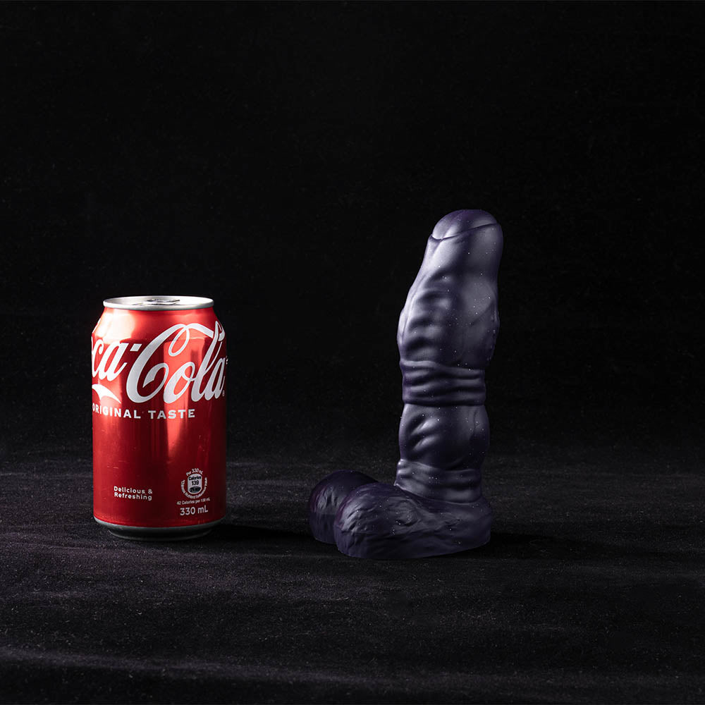 Galactic Twilight fantasy dildo displayed diagonally, showcasing dual knots and nubbed spine against black background.